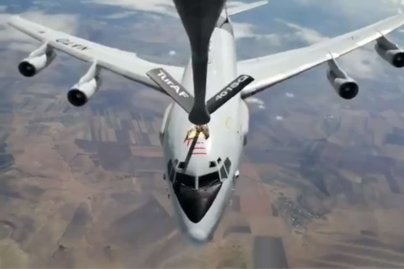 A Turkish tanker aircraft refuels a NATO AWACS aircraft, Turkey Defense Ministry says